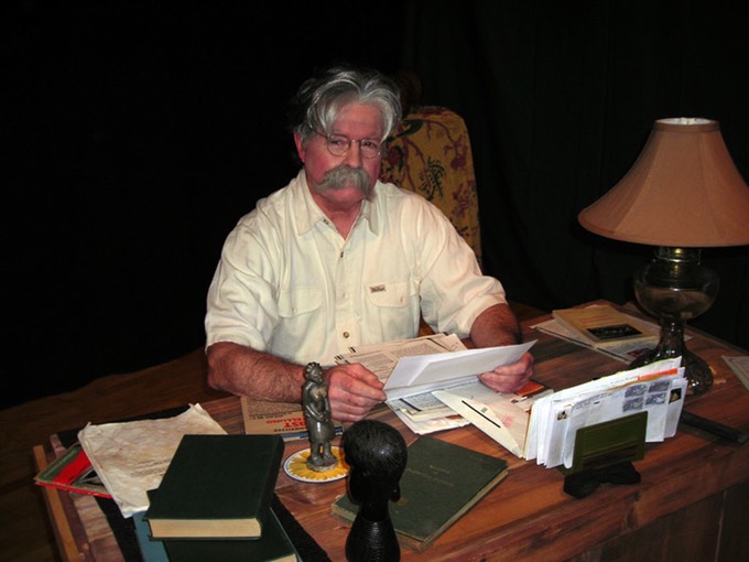Memoirs_sitting-at-desk.jpg